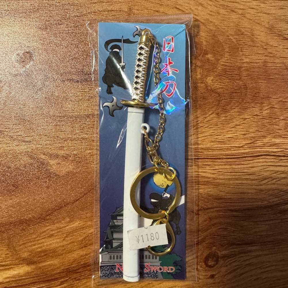 Miniature Samurai Sword Keychain with Gold and White Details